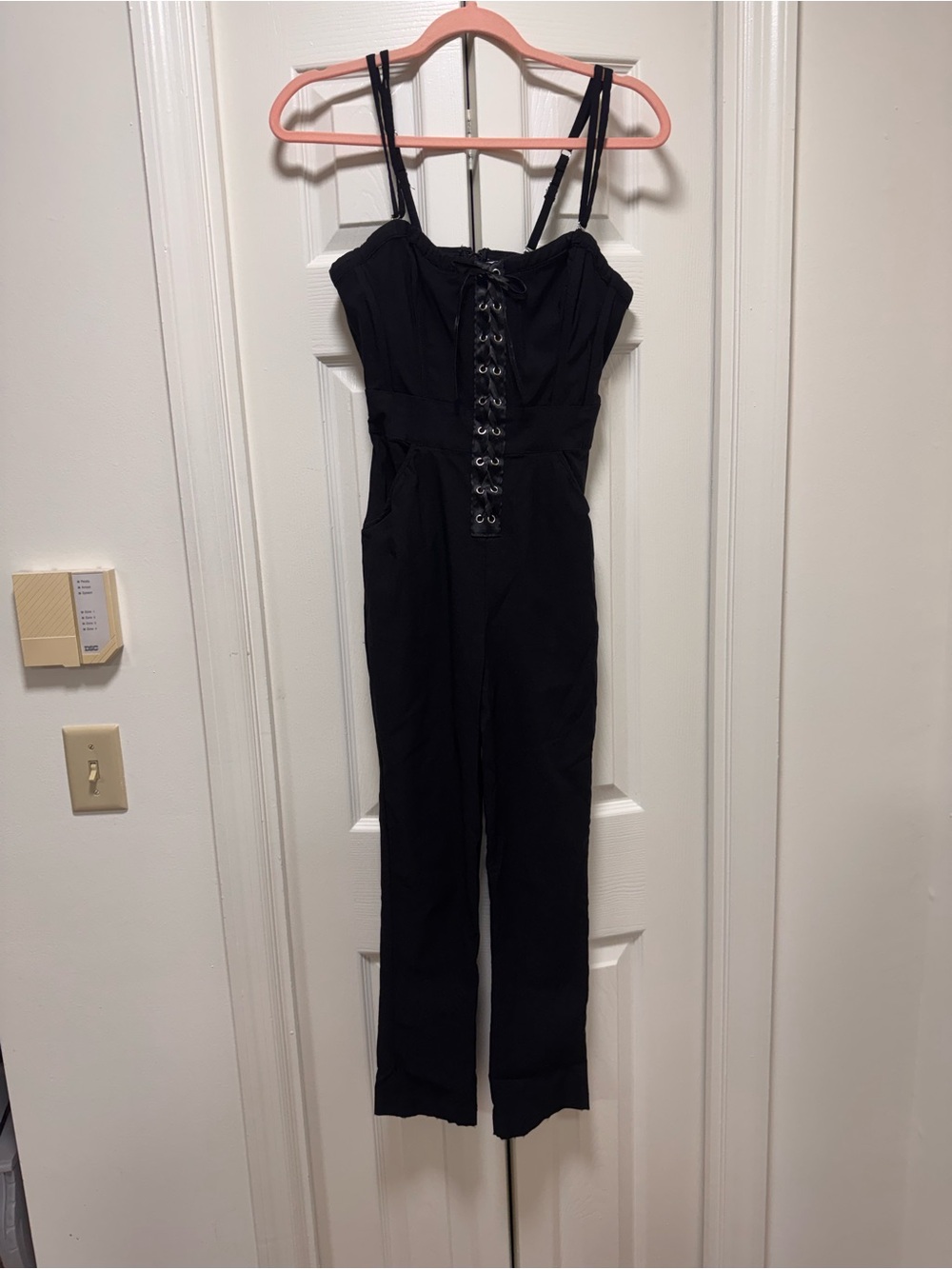 Unique Vintage Black Lace-Up Jumpsuit with Adjustable Straps